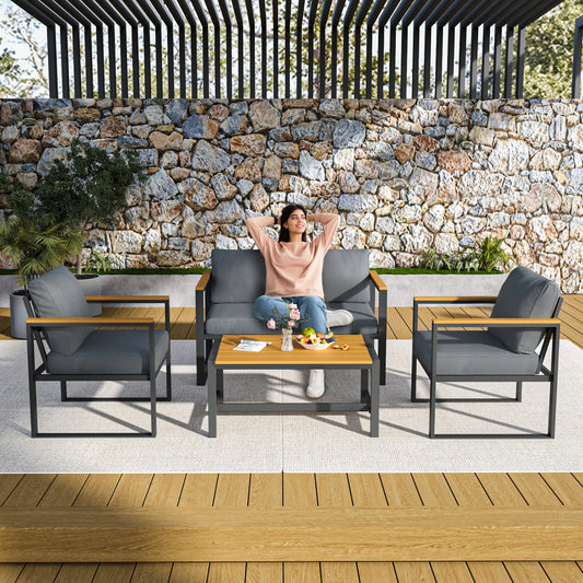 Outdoor Four-Piece Patio Set With Metal Frame And Coffee Table
